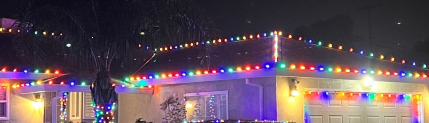 Christmas light installation in Loomis, CA: multicolor c9 garage eave run