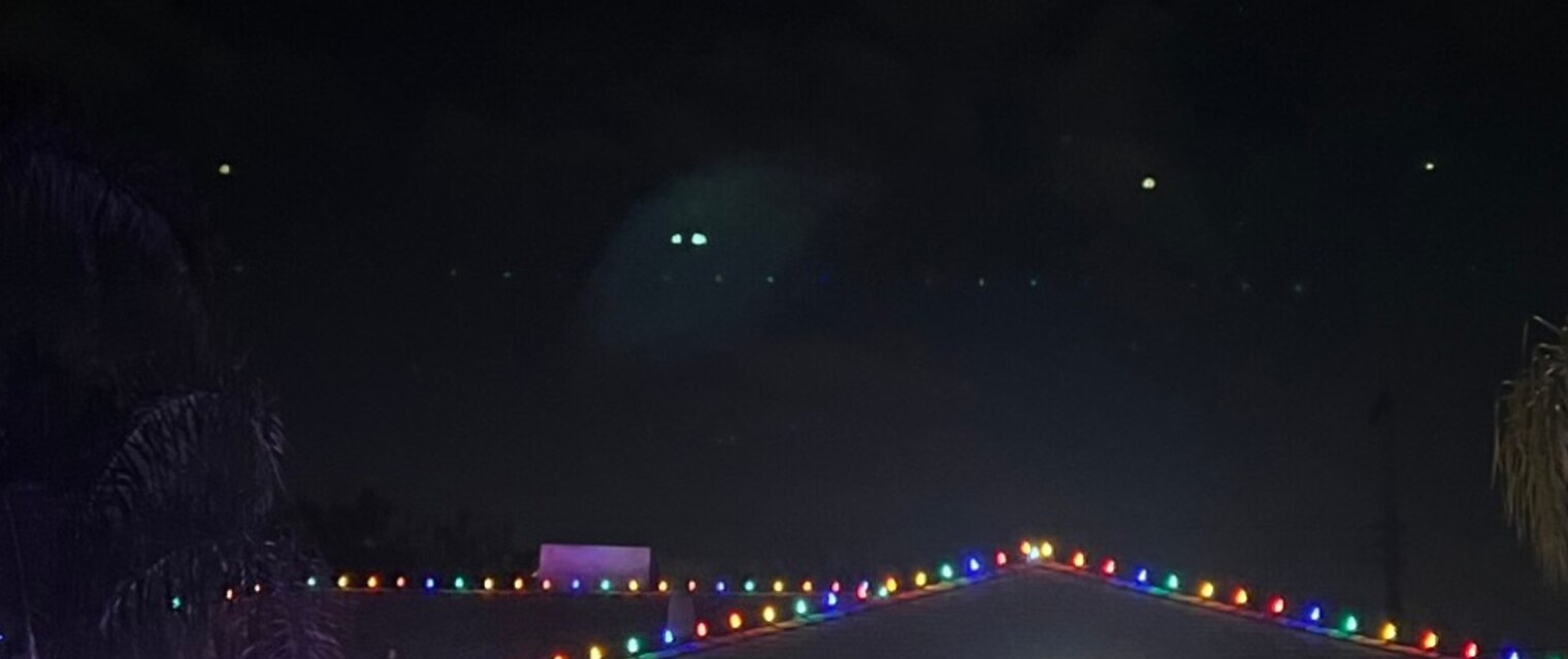 Holiday lighting in Auburn, CA: multicolor c9 roofline run hip roof